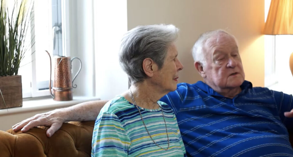 senior couple in blue shirts