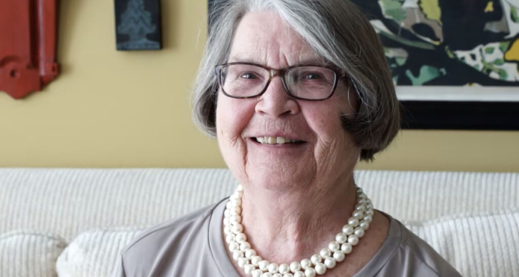 senior woman with pearl necklace